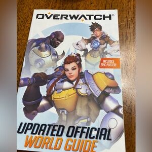 Overwatch: updated official world guide. Book by Caleb Hewitt & Tarra Winters.
